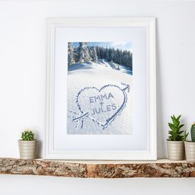 C�ur dans la neige � tableau en cadre blanc